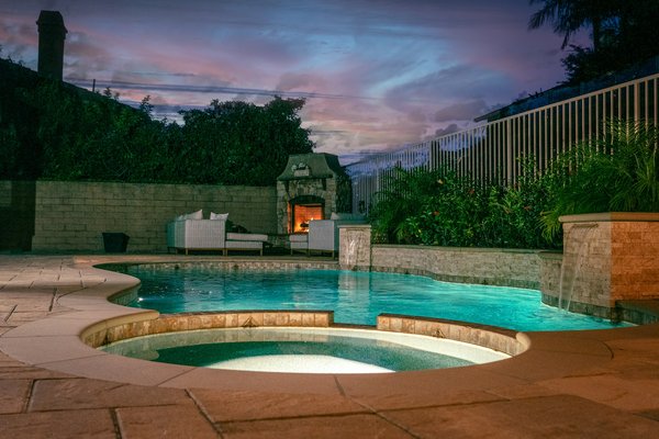 How can you effectively use color LED lights to create mood settings in UK swimming pools?