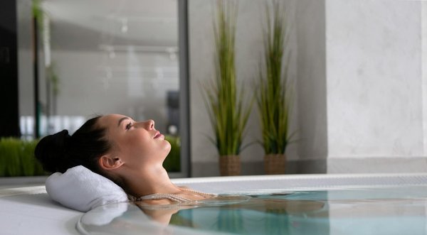 What is the best way to integrate a spa area next to your UK home swimming pool?